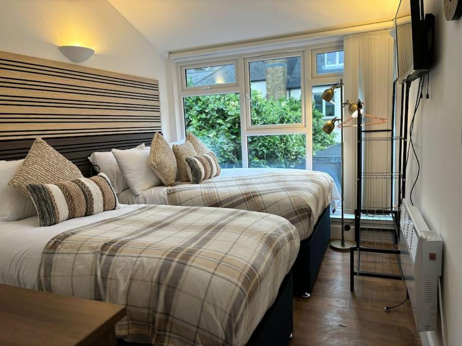The Urban Retreat 4bdr Sleep 14 Casa vacanze Londra